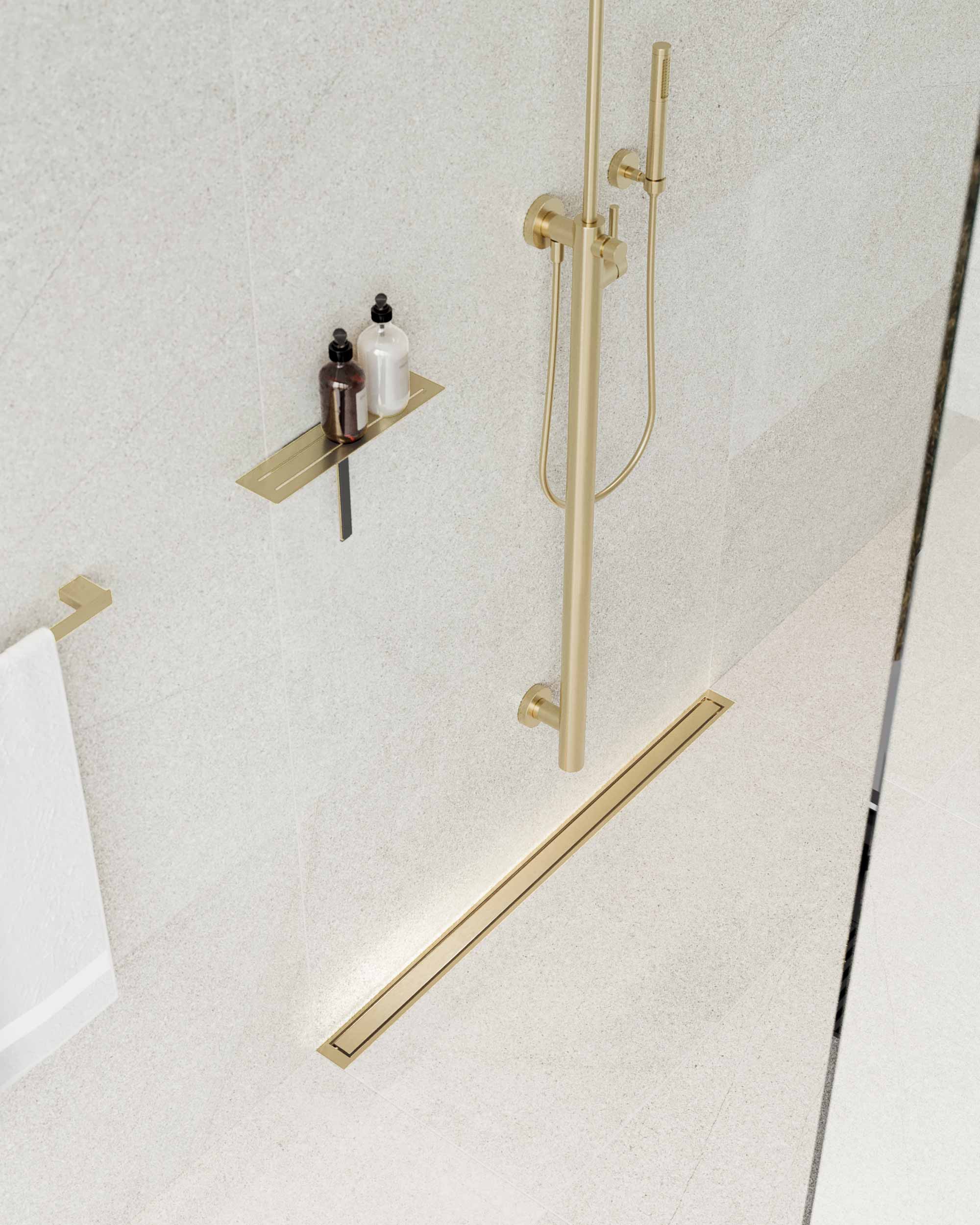 Golvbrunn och dusch i guld