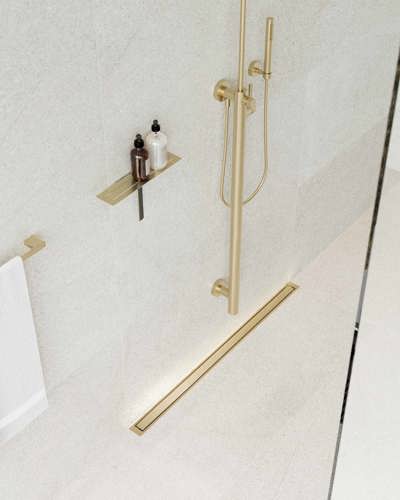 Golvbrunn och dusch i guld