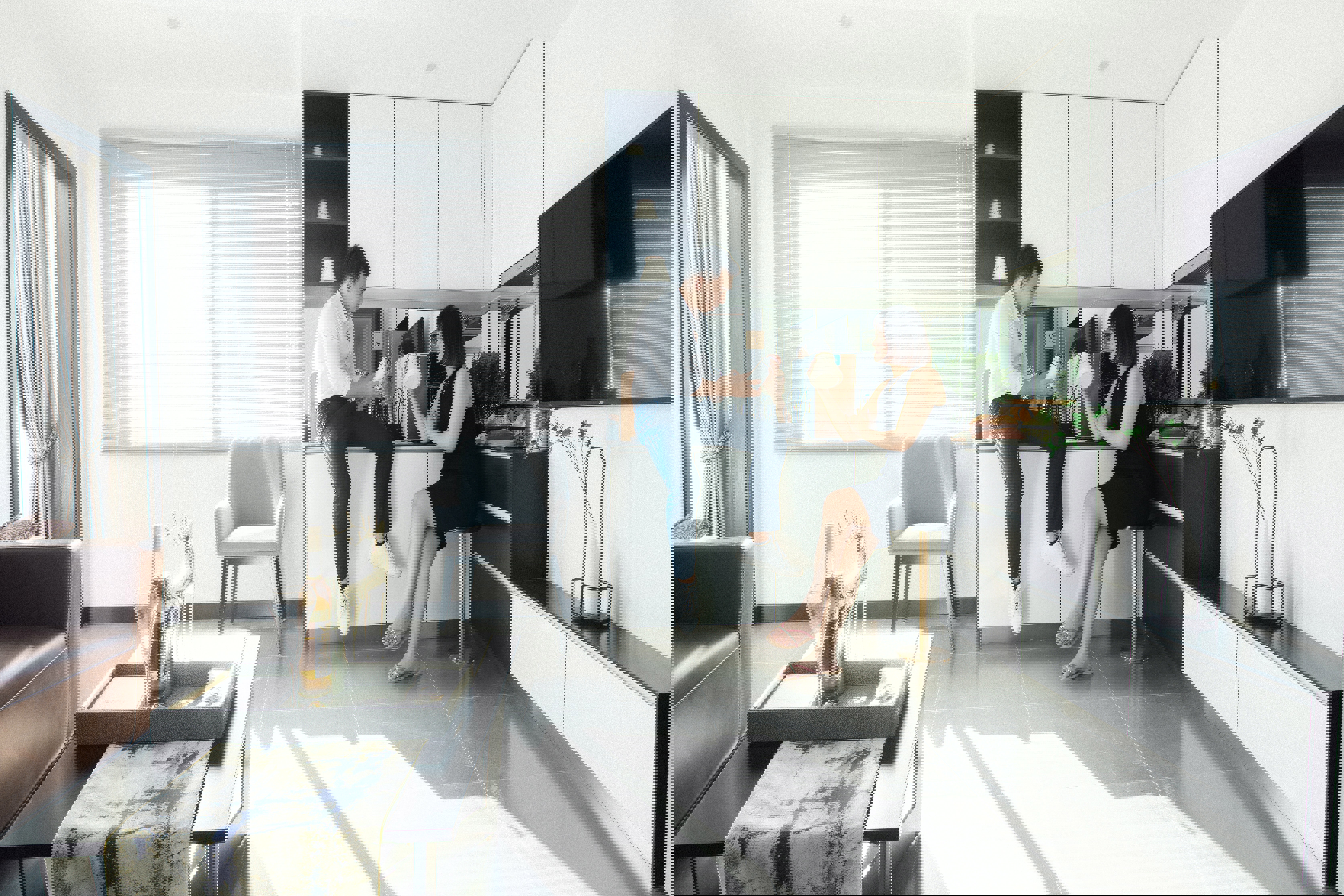 Ett par som sitter i köket i sin lägenhet